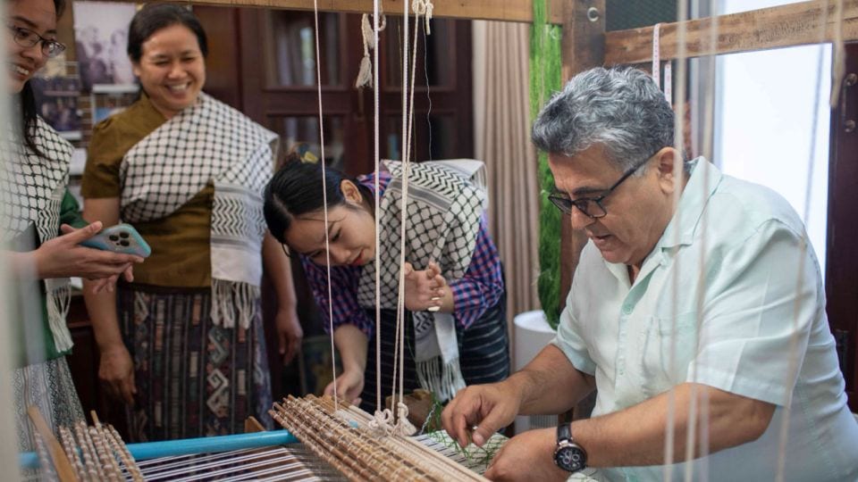 Lao silk weavers craft keffiyehs in solidarity with Palestine